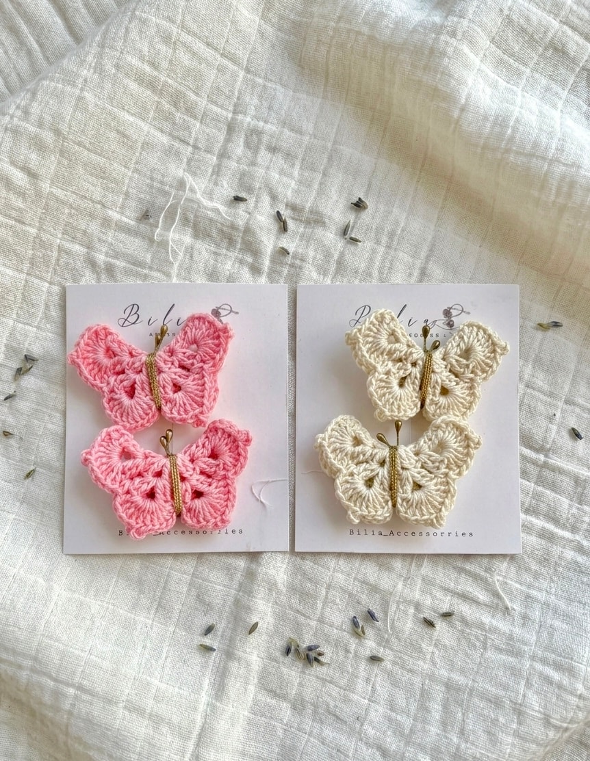 handmade crochet butterfly hair clips in pink and cream 